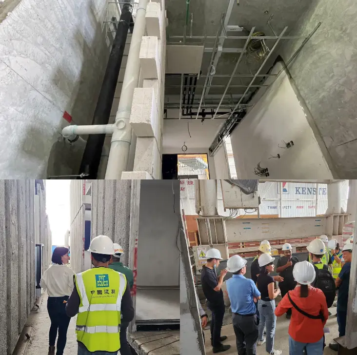 Project team inspecting PPVC module services and workmanship at a production facility