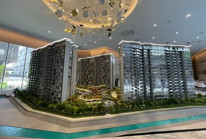 Detailed residential development model displayed inside a sales gallery