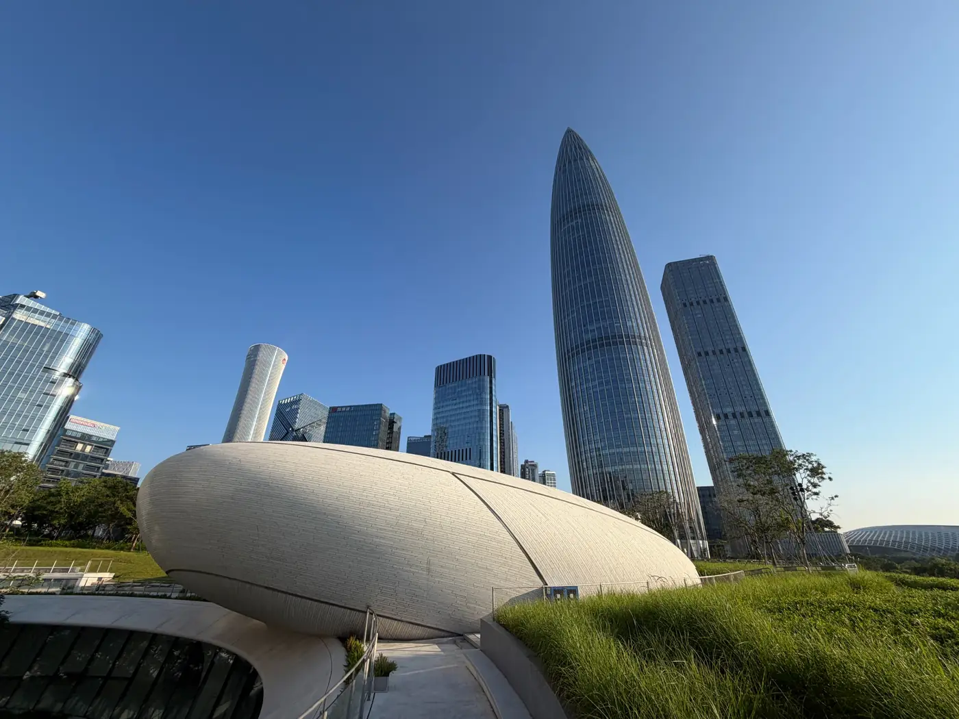 Shenzhen Bay skyline and landscaped public realm around the Super Headquarters district
