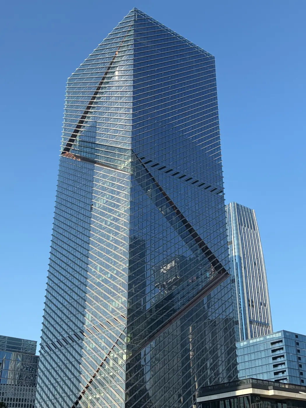 Highly articulated glazed commercial tower facade in Shenzhen