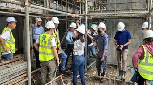 Project team conducting a construction site walkthrough