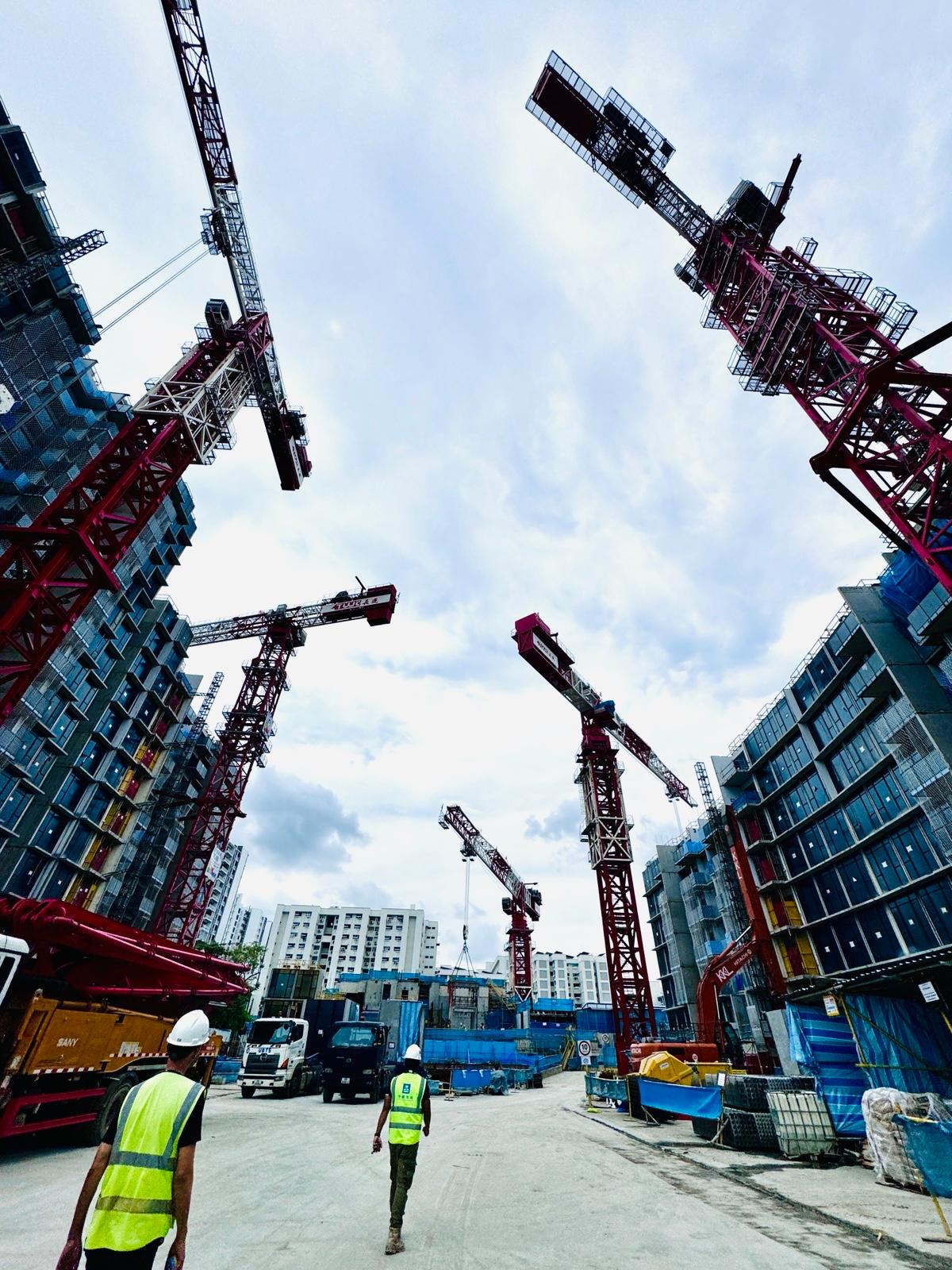 Grand Dunman during construction with multiple tower cranes